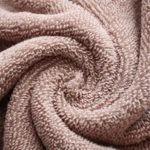 Thickened pure cotton solid color face towel with soft absorbent loops for daily use.