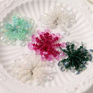 Detailed close-up of colorful crystal beaded sequin flower DIY accessories for crafting earrings.