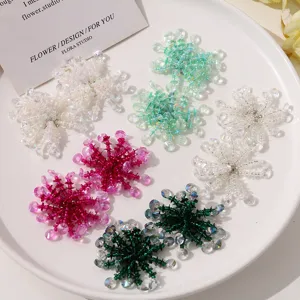 Detailed shot of colorful crystal beaded snowflake DIY jewelry accessories, multi-color options.