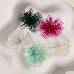 Detailed view of colorful crystal beaded rhinestone flower DIY accessories for earrings and brooches.
