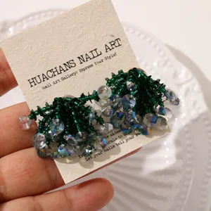 Detailed shot of sparkling green sequin crystal beaded flower accessory, DIY jewelry part.