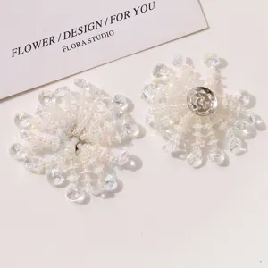Detailed view of sparkling crystal beaded flower DIY accessories for crafts and decor.