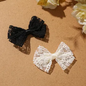 Zwart witte kanten strik DIY accessoires, perfect geschikt voor haarklemmen en schoenen.