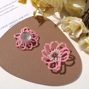 Pink white beaded flower DIY accessory, hollow floral design, ideal for earrings and brooches.