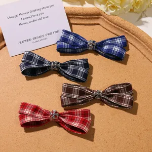 Plaid bow hair clips with retro metal cross design, sweet JK style side clips for daily wear.