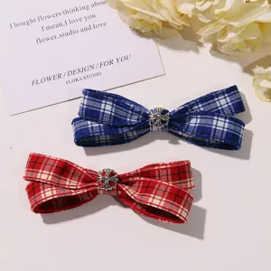 Korean style plaid bow hair clip with vintage metal cross ornament for cute JK uniform styling.