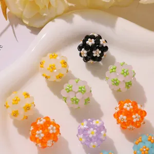 Colorful 3D daisy beaded flower glass balls, close-up detail shot for DIY jewelry accessories.