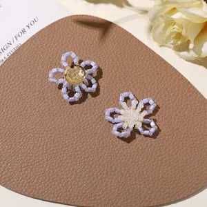 Handcrafted beaded hollow flower DIY accessories for cute earrings, rings and hair decorations.