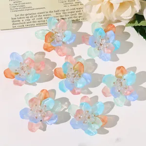 Detailed view of colorful resin flower DIY charms with crystal beaded centers, fresh style.