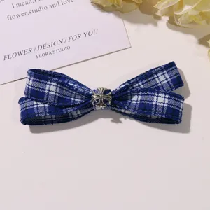 Blue plaid bow hair clip detail with silver cross metal decoration, perfect for daily styling.