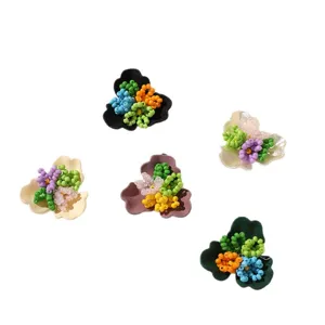 Colorful beaded flower DIY charm accessories set for earrings, shoes, and handmade jewelry crafting.