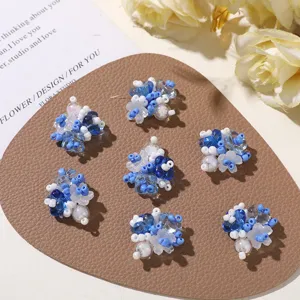 Summer island sea salt blue beaded flower DIY earrings hair accessories clothing details shot.