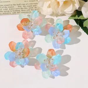 Detailed view of summer sea salt blue 3D flower DIY accessories, clear resin petals and beads.