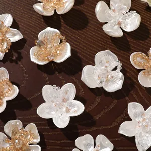 Exquisite pearl crystal flower patch for DIY jewelry, delicate floral accessory detail.