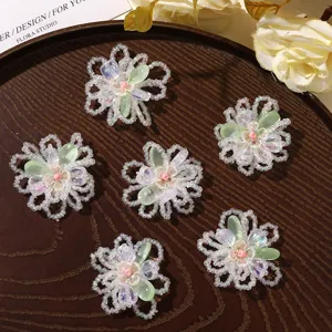 Close-up view of colorful glass beaded hollow flower DIY accessories for crafts and jewelry.