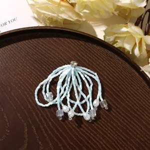 Exquisite light blue beaded crystal tassel hair accessory detailed view, elegant DIY clothing decor.