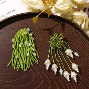 Green beaded flower DIY shoe charms and earrings accessories, fresh summer style details.