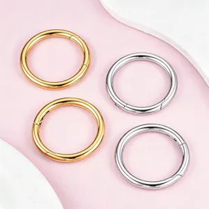 Detailed close-up of stainless steel spring round rings, gold and silver color clasp options.