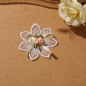 Exquisite 3D lace flower patch with mesh ribbon roses and bow for DIY craft apparel.