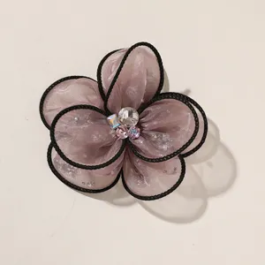 Mesh fabric flower DIY accessory with rhinestone center for hair clips, bags, and apparel.