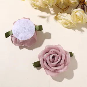 Pink mesh rose fabric flower detail, perfect for DIY hair clips, hats, and clothing corsages.