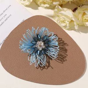 Handcrafted blue beaded flower brooch accessory, perfect for summer vacation beach style and DIY fashion.