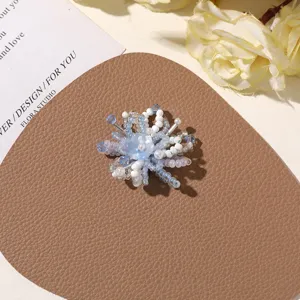 Handmade blue beaded flower DIY accessory, perfect for earrings, brooches and hair clips.