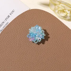Handmade sea salt blue beaded flower DIY accessory, perfect for island vacation style and brooch.