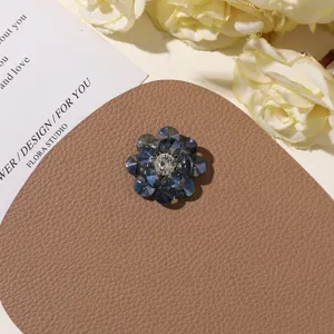Blue crystal beaded flower brooch detail, handmade DIY accessory for vacation style.