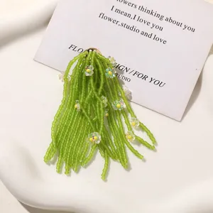 Green beaded flower DIY accessory charms for earrings hair clips and summer beach trips