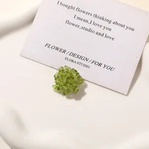 Green beaded flower DIY accessory, charming floral charm for earrings and shoes.
