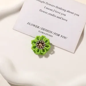 Green beaded flower DIY accessory, handmade charm for earrings, hairpins and clogs.