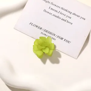 Green resin flower DIY accessory for cute earrings, hairclips, and nice shoe charms.