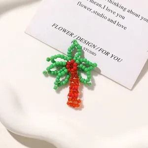 Green beaded flower DIY shoe charms and hair clip accessories, fresh style for summer travel.