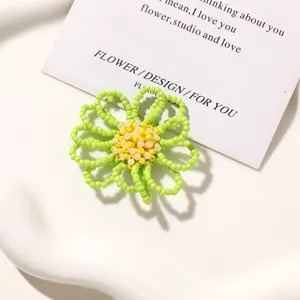 Close-up of fresh green beaded flower DIY accessory, perfect for custom handmade jewelry and shoes.
