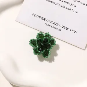 Green beaded flower detail view, ideal for creative DIY earrings, hairpins and shoe charms.