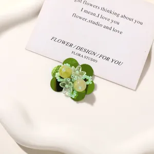 Green beaded flower DIY accessory, delicate design for summer style jewelry making charm.