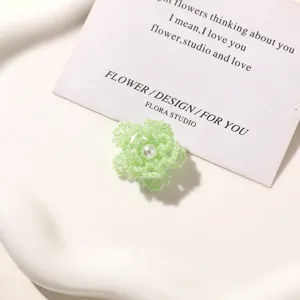 Green beaded flower detail shot, perfect for DIY earrings, hair clips and shoe charms.