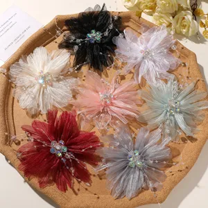Mesh crystal beaded flower hair clips and apparel decorative accessories in rich colors.