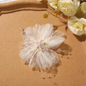 Detail shot of sweet mesh crystal beaded flower hair accessory DIY material, elegant style.