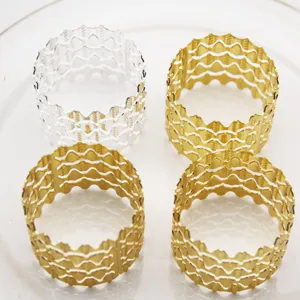 Metal napkin rings set, hollow wave design table decor for hotel and home dining use.