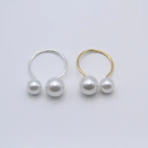 Adjustable U-shaped open ring featuring elegant large and small asymmetric pearls for women.