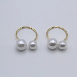 Elegant double pearl open ring featuring adjustable U-shaped gold band for women fashion.