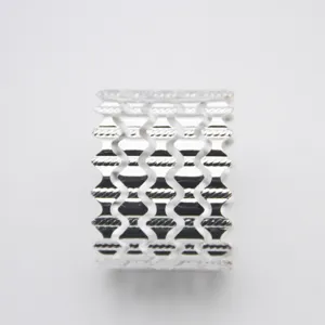 Silver metal napkin ring with hollow rhombus wave pattern for elegant hotel table decor.