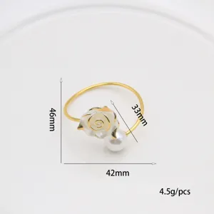 Gold napkin ring with white rose and pearl, elegant table decor for wedding and Valentine day.