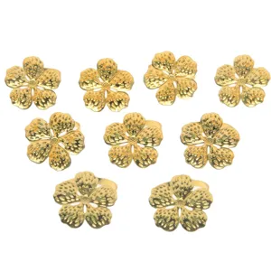 Gold flower napkin rings set of 9, elegant alloy table decor for dining parties and home hotels.