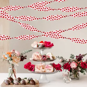 Valentine heart paper streamer hanging party decoration scene detail display setup.