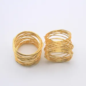 Gold wire napkin rings for dining table decor, luxury metal napkin holders set of two.