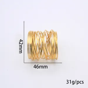 Golden metal hollow wire napkin ring, 46x42mm table decoration detail shot for dining.