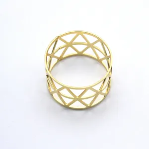 Gold metal hollow napkin ring geometric table decor wedding party dining accessory detail view